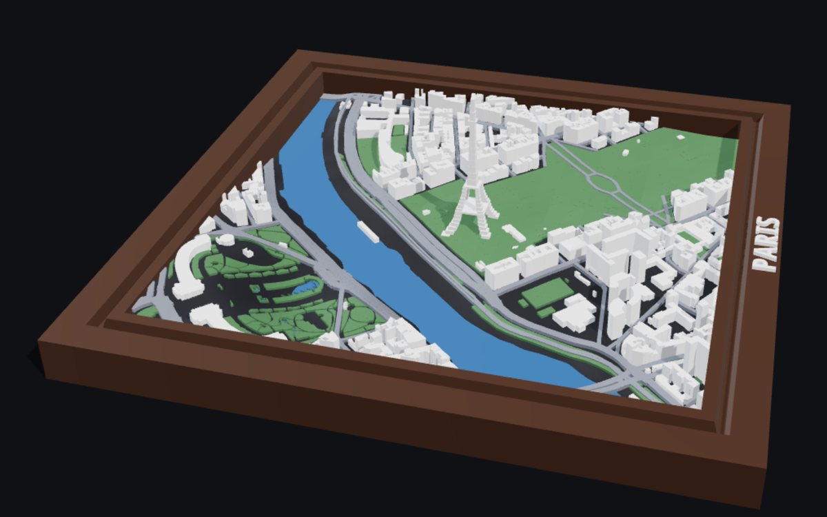 A BambiMaps city relief of Paris around the Eiffel Tower, in a brown picture frame lettered PARIS