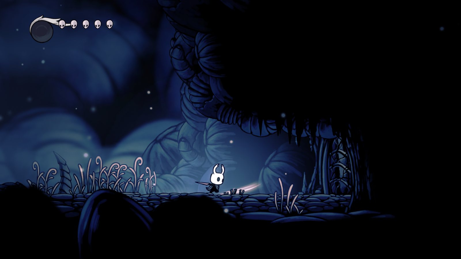 Hollow Knight gameplay in King's Pass, the Knight mid nail-swing, rendered by Ferrum on an Apple M5